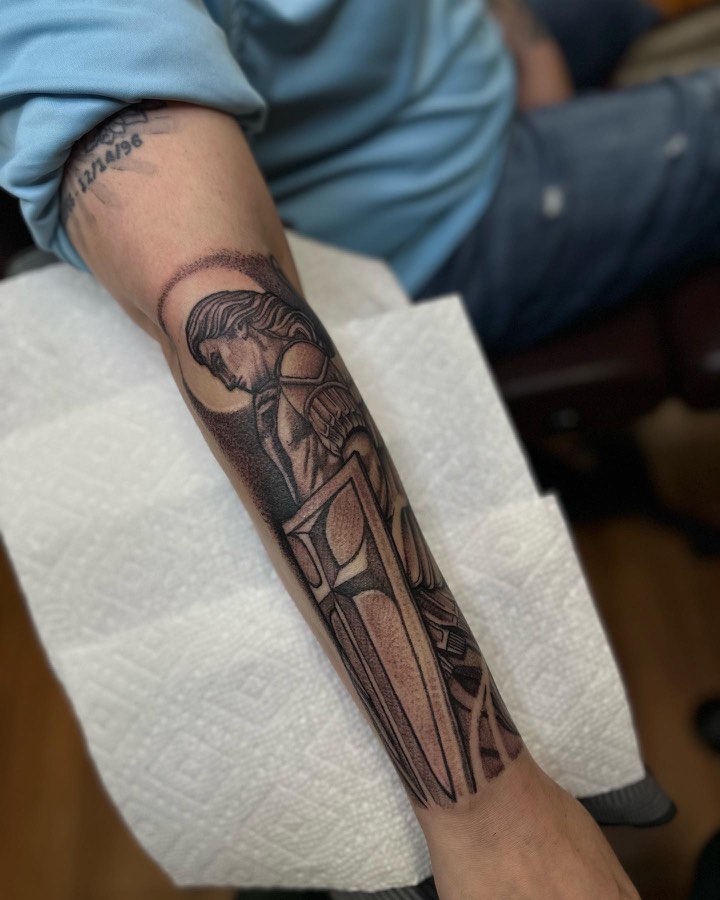 Black and grey tattoo by Andy Electric