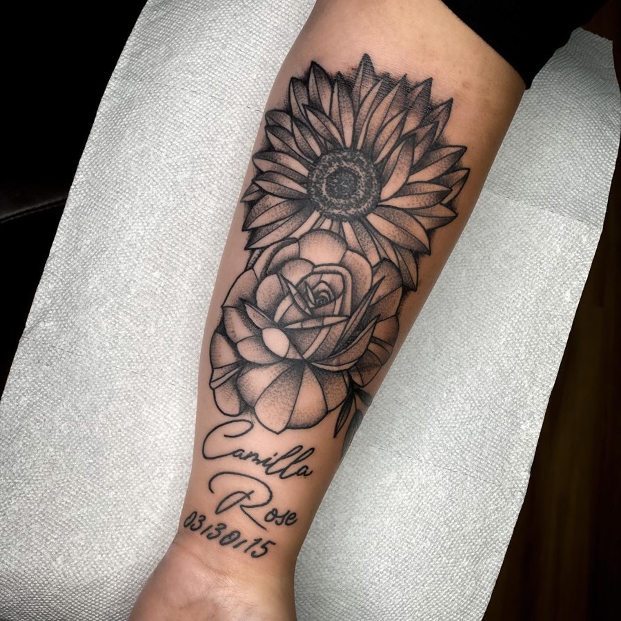 Black and grey tattoo by Andy Electric