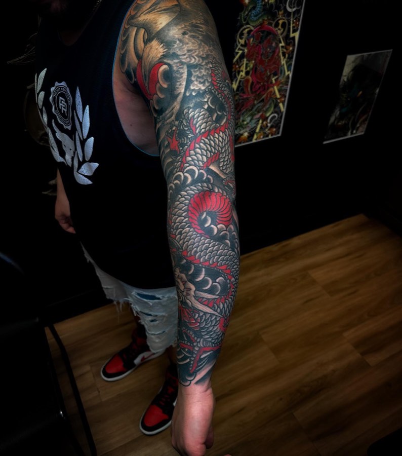 Black and grey tattoo by Andy Electric