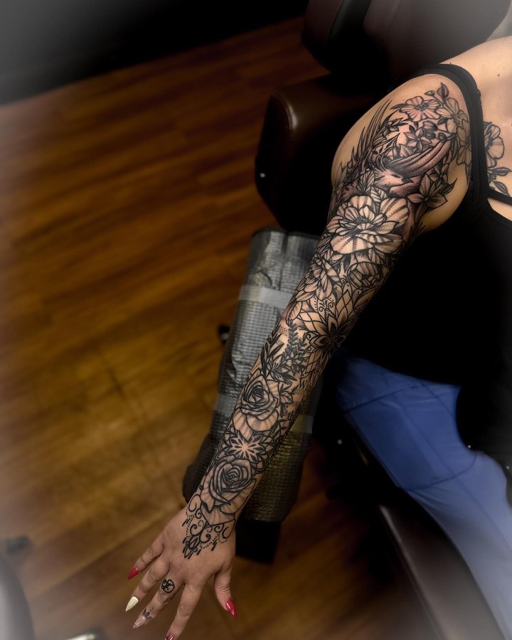 Black and grey tattoo by Andy Electric